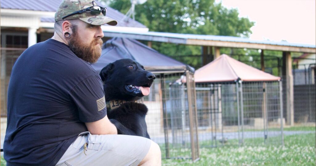 obedient dog with its trainer